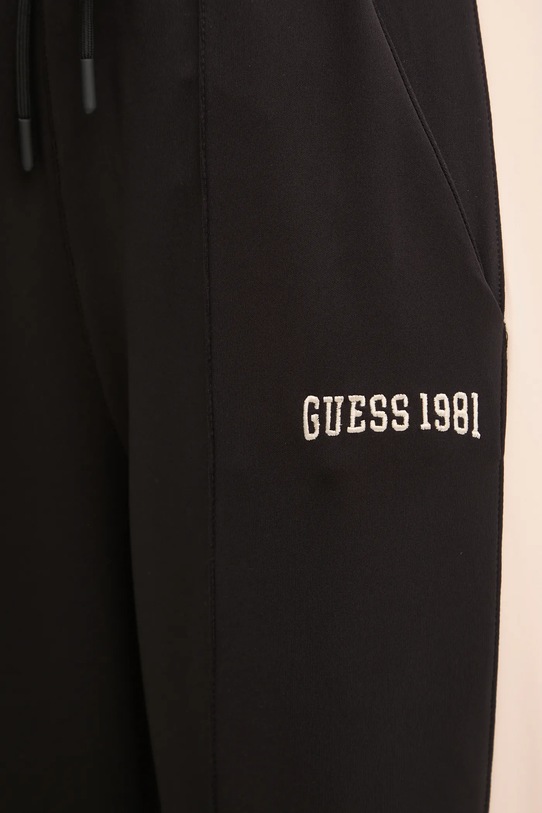 Tepláky Guess SUZANNE černá V5RB00.KCO72