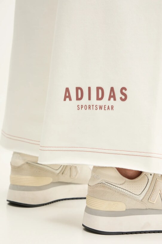 Спортивні штани adidas ALL SZN Graphic JJ4530 бежевий