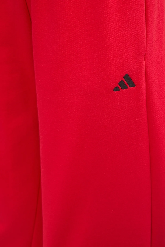 Tepláky adidas Essentials červená JI6051