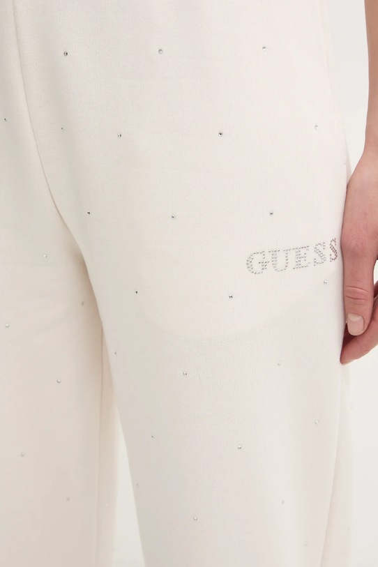 Guess spodnie dresowe RHINESTONES beżowy V5RB08.KCLJ0