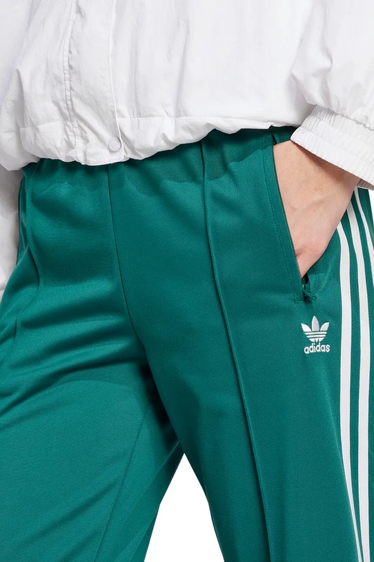 Одяг Спортивні штани adidas Originals Firebird JC8284 зелений