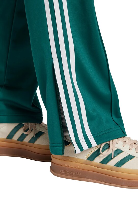 Tepláky adidas Originals Firebird zelená JC8284