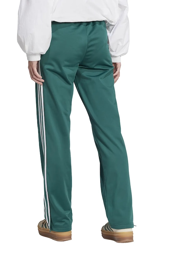 Tepláky adidas Originals Firebird JC8284 zelená