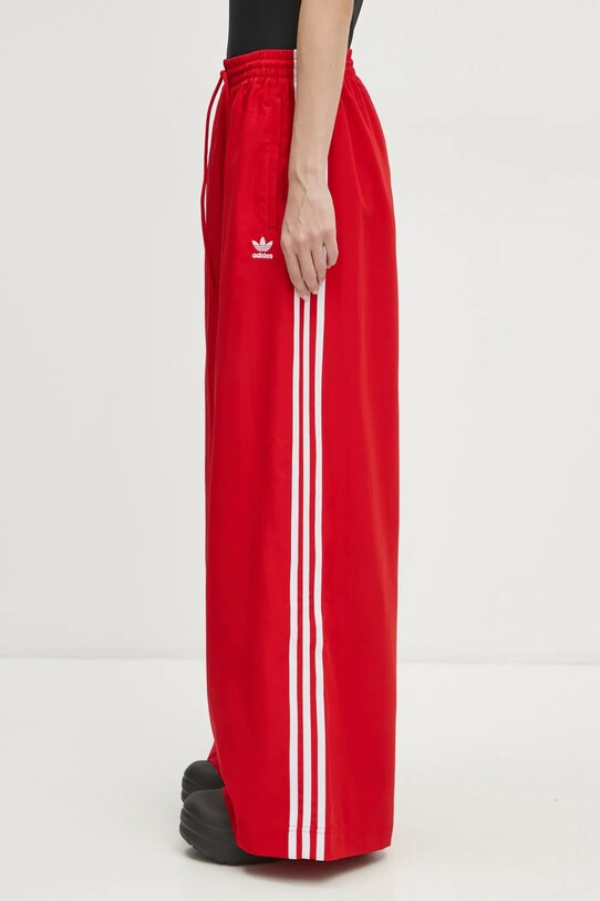 Donji dio trenirke adidas Originals OVERSIZED TP JD3388 crvena SS25