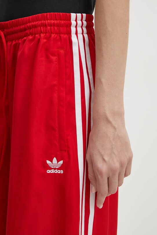 Donji dio trenirke adidas Originals OVERSIZED TP crvena JD3388