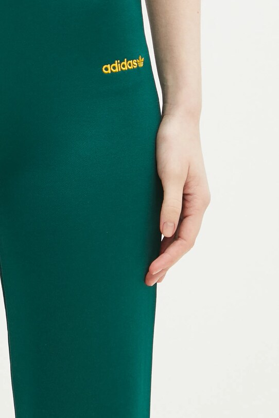adidas Originals spodnie dresowe FLARED PANTS zielony JC7689