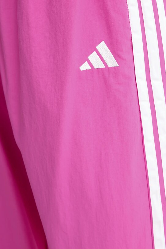 Tepláky adidas Essentials růžová JC8167