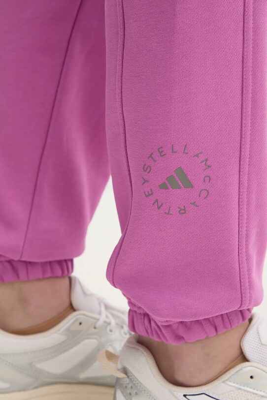 Хлопковые спортивные штаны adidas by Stella McCartney фиолетовой JD2709