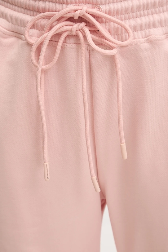 Βαμβακερό παντελόνι adidas by Stella McCartney ροζ JJ0103