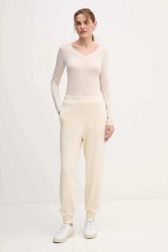 Bavlněné tepláky United Colors of Benetton 3UNIDF01A béžová AW25