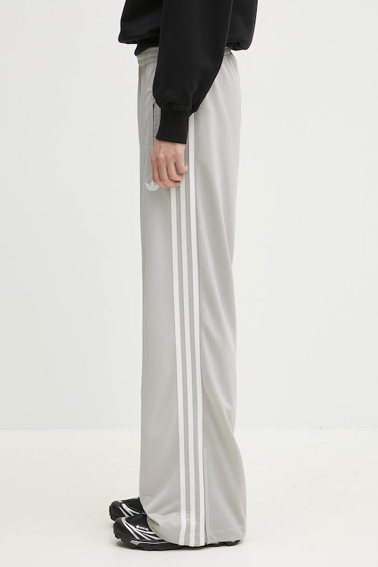 Donji dio trenirke adidas Originals Firebird JC8249 siva SS25