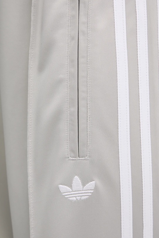 Tepláky adidas Originals Firebird sivá JC8249