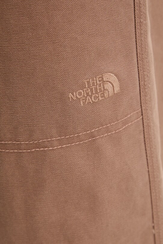 The North Face spodnie bawełniane Cedar Canvas Work brązowy NF0A8B9D6IH1