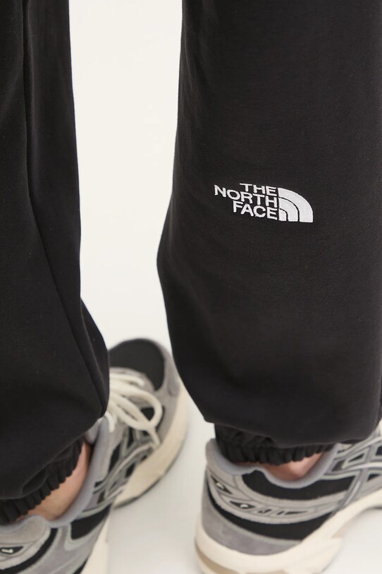 Tepláky The North Face Essential Relaxed černá NF0A8C1GJK31