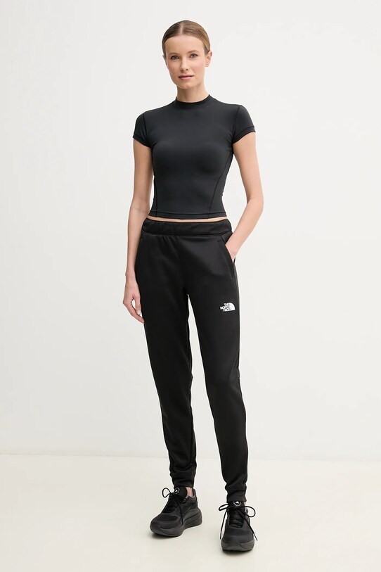 The North Face pantaloni de trening Reaxion NF0A8CNSJK31 negru SS25
