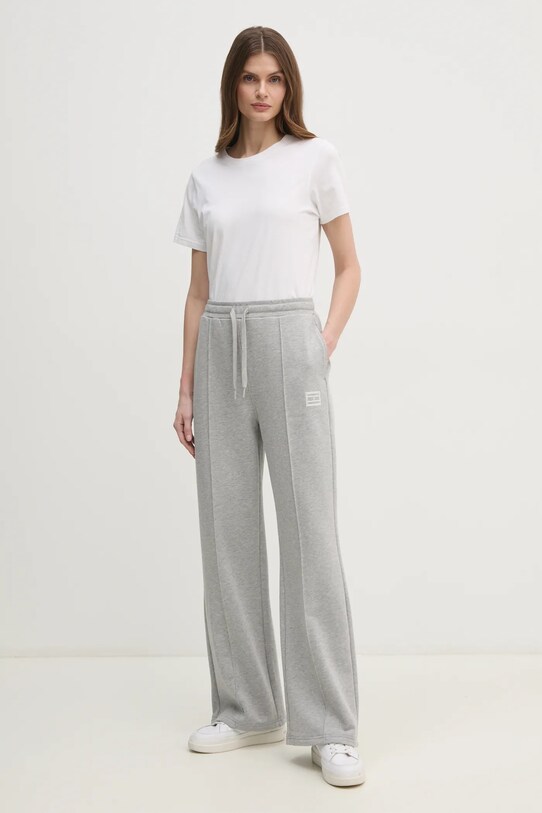 Хлопковые спортивные штаны Tommy Hilfiger WW0WW44678 серый SS25