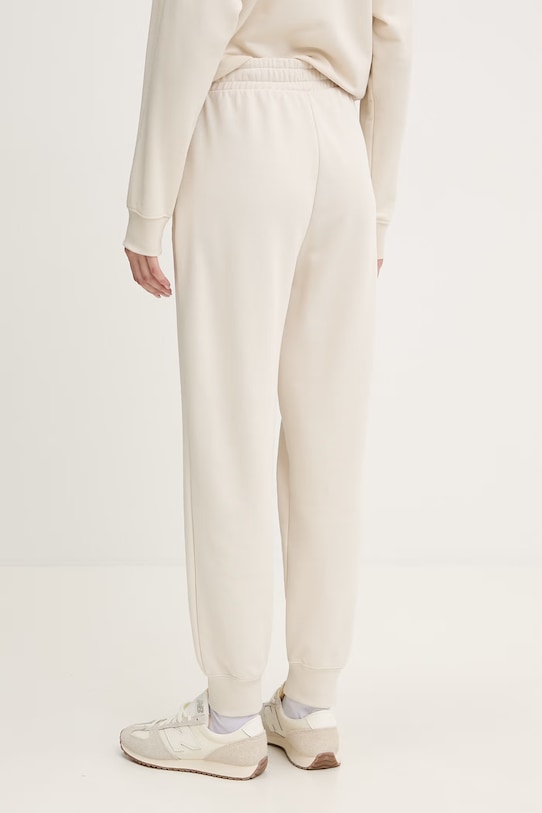 Ρούχα Παντελόνι φόρμας Puma Essential Logo 682459 μπεζ