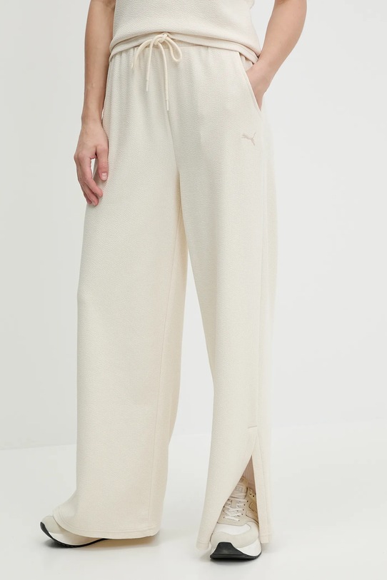 Puma spodnie dresowe z elastanem beżowy 685061