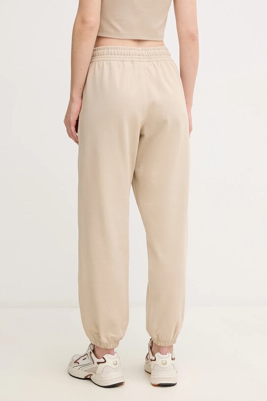 Odzież Calvin Klein Jeans spodnie dresowe LV047B235G beżowy