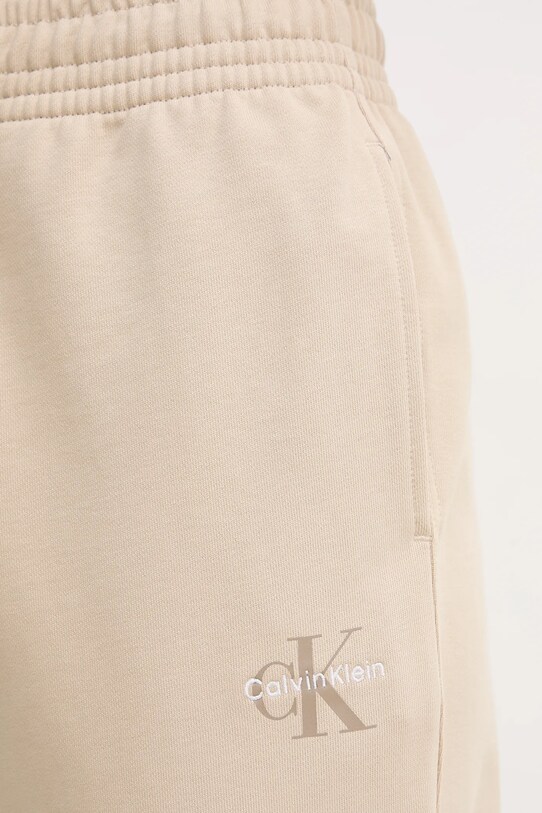Calvin Klein Jeans spodnie dresowe beżowy LV047B235G
