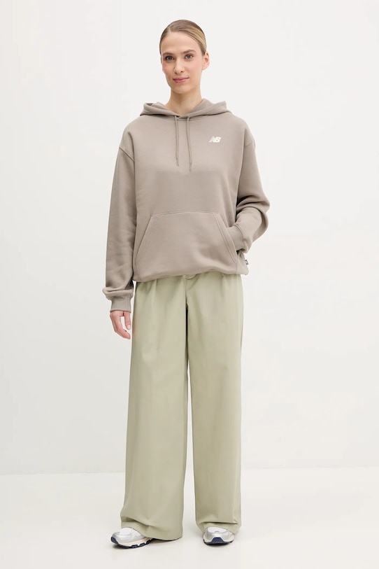 New Balance pantaloni WP51538OVN verde SS25