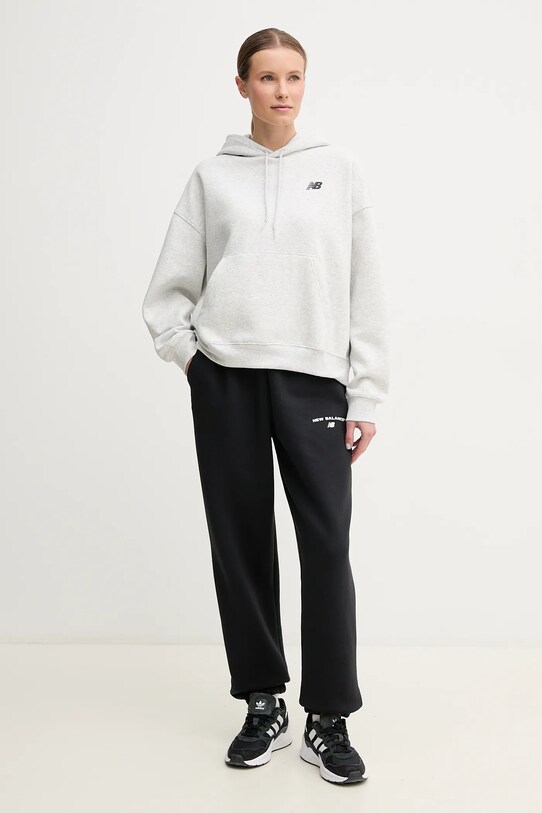 Tepláky New Balance WP51500BK čierna SS25