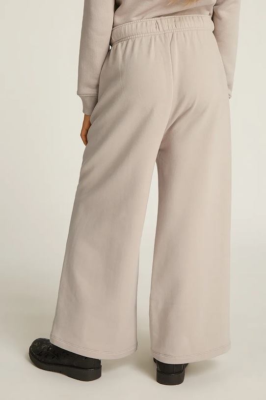 Calvin Klein Jeans spodnie dresowe dziecięce HANDW LOGO WIDE beżowy IG0IG02775.116.PPYA