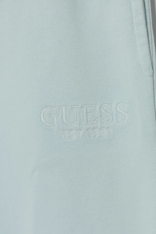 DÍVKA Dětské bavlněné tepláky Guess J5RQ12.KAD74.PPYA tyrkysová