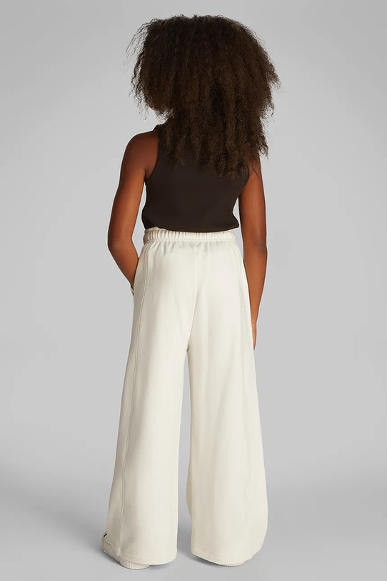 Детские спортивные штаны Calvin Klein Jeans бежевый IG0IG02876.128.176.PPYA