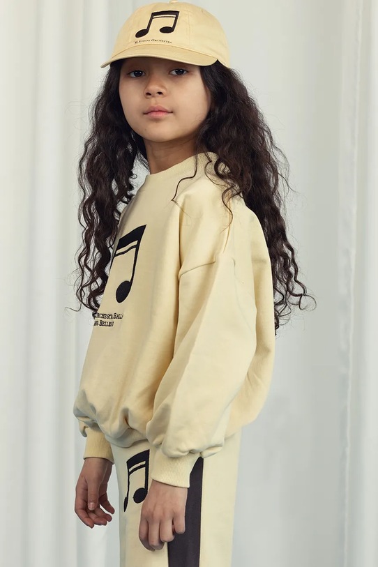 Παιδικό βαμβακερό παντελόνι Mini Rodini Note 2523011123 κίτρινο