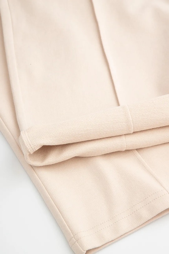 Coccodrillo spodnie dresowe dziecięce beżowy WC5120101VGA