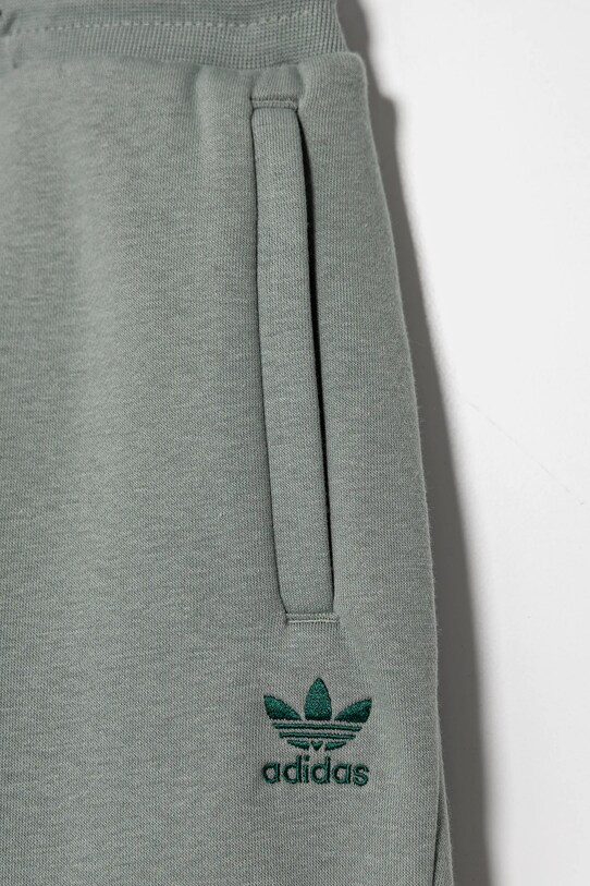 Дитячі спортивні штани adidas Originals зелений JI5824