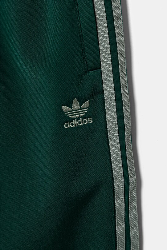 Дитячі спортивні штани adidas Originals зелений JD1616