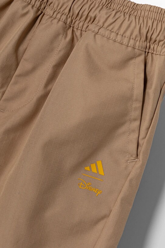 Дитячі штани adidas бежевий JD4553