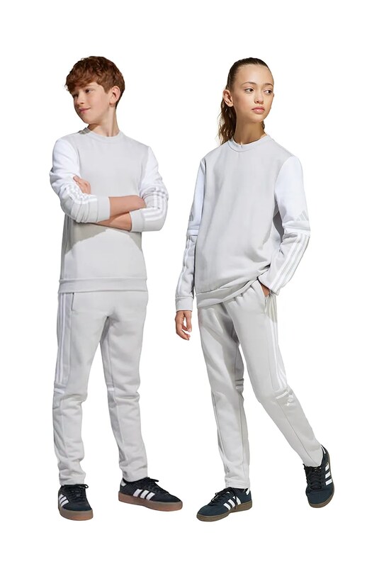 Otroški spodnji del trenirke adidas Performance Pletenina siva JD4823