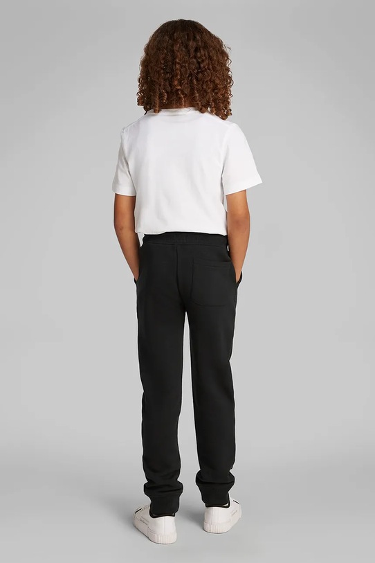 Dječji donji dio trenirke Calvin Klein Jeans crna IU0IU00621.PPYA