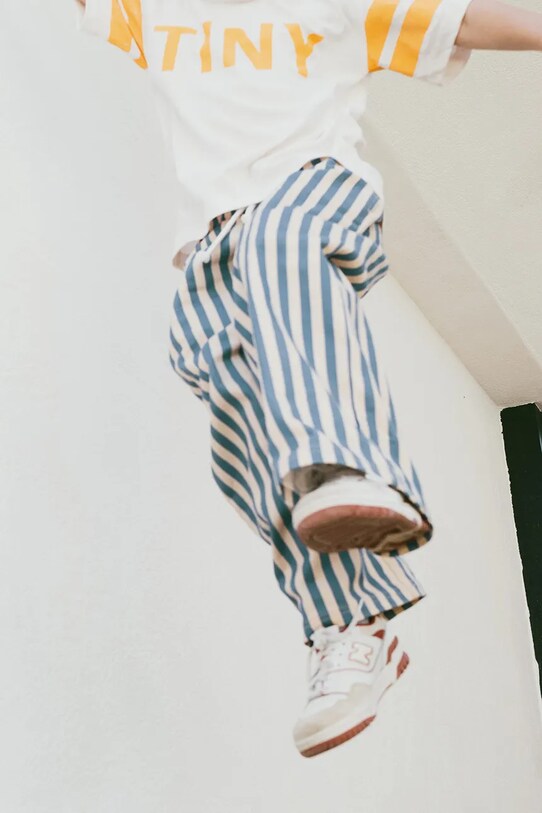 Tinycottons spodnie bawełniane dziecięce STRIPES WOVEN PANT SS25.229 niebieski