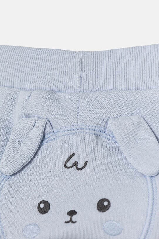Chłopiec United Colors of Benetton spodnie dresowe bawełniane niemowlęce 3J70AF029.W.Seasonal niebieski