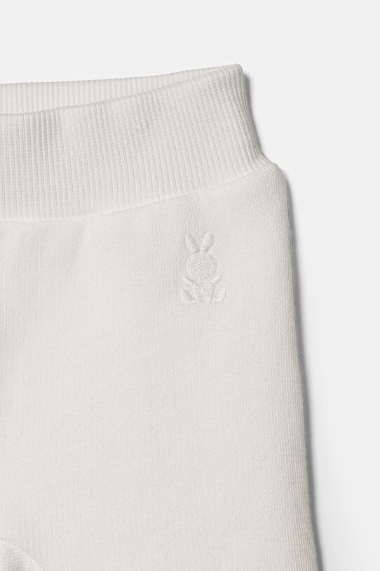 Chłopiec United Colors of Benetton spodnie dresowe bawełniane niemowlęce 3J70AF01R.W.Reproposed biały