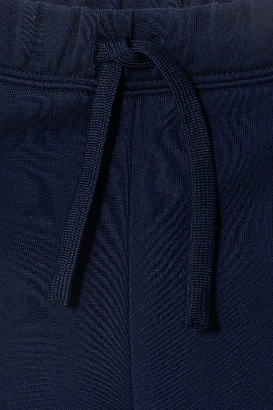 Detské bavlnené tepláky United Colors of Benetton 3J68GF027.P.Reprop.PPYA tmavomodrá SS25