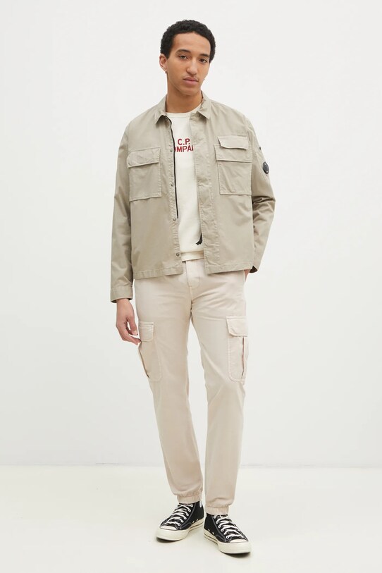 Бавовняні штани Tommy Jeans DM0DM20284 бежевий SS25