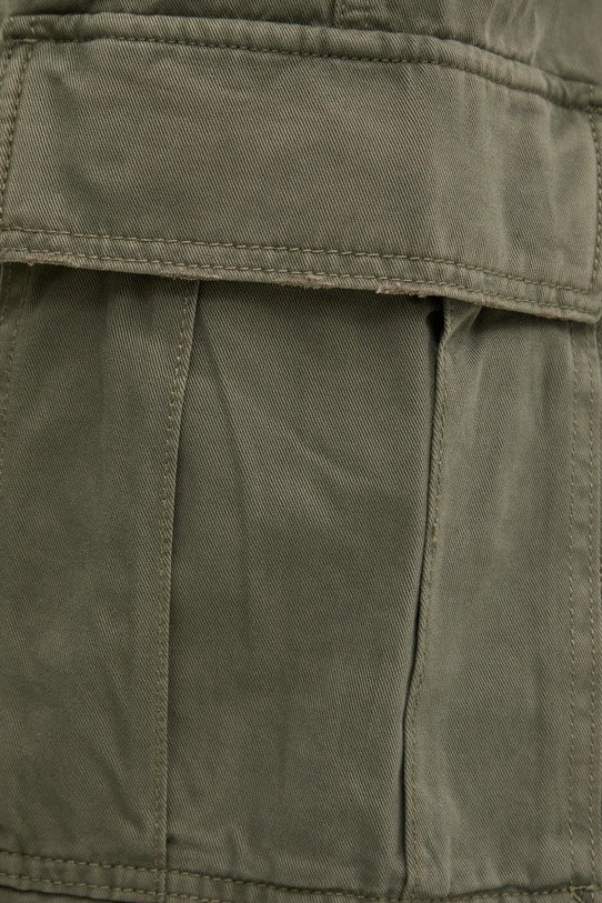 Бавовняні штани Tommy Jeans зелений DM0DM20293