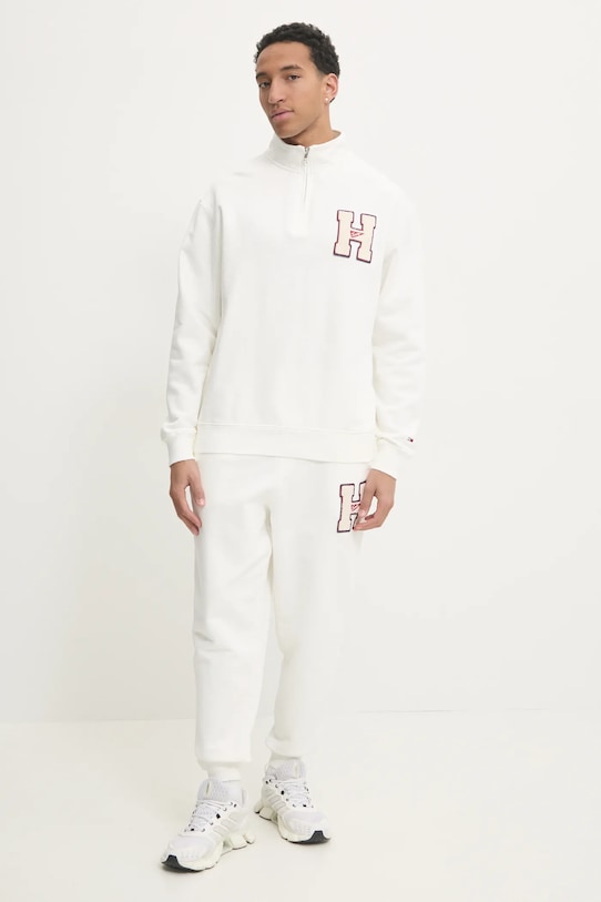 Tommy Jeans spodnie dresowe bawełniane DM0DM21277 beżowy SS25