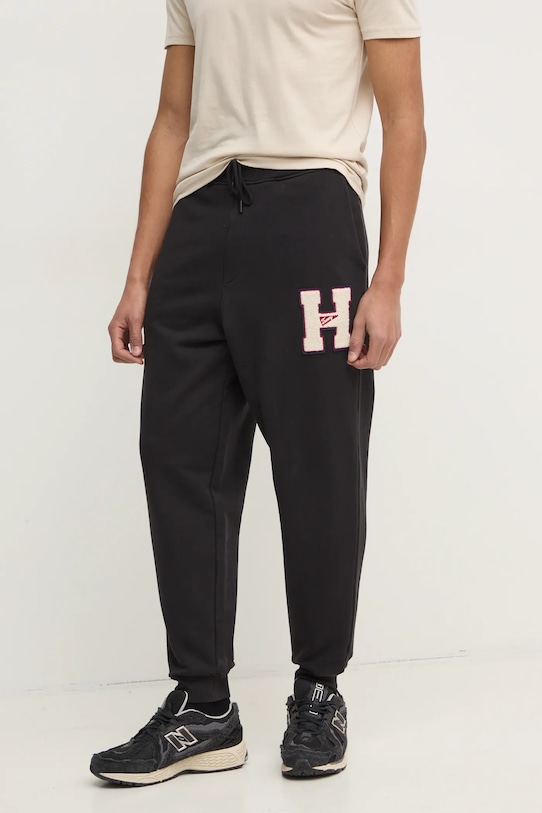 Bavlněné tepláky Tommy Jeans pletenina černá DM0DM21277