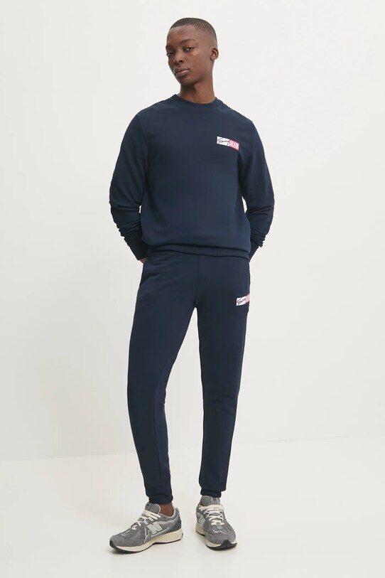 Бавовняні спортивні штани Tommy Jeans DM0DM20277 темно-синій SS25