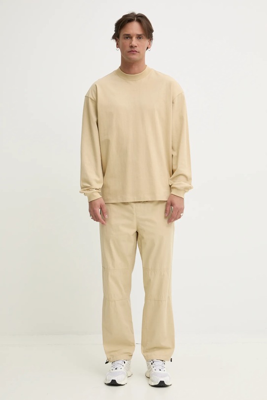 Бавовняні штани HUGO 50530916 бежевий SS25