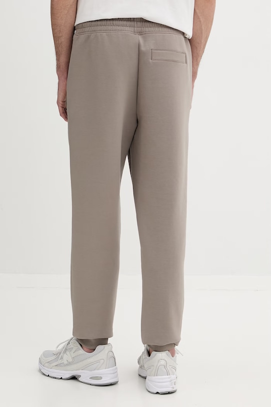 Ρούχα Παντελόνι φόρμας HUGO 50533695 μπεζ
