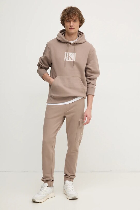 Бавовняні спортивні штани Calvin Klein Jeans J30J326762 бежевий SS25