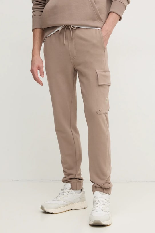 Бавовняні спортивні штани Calvin Klein Jeans бежевий J30J326762