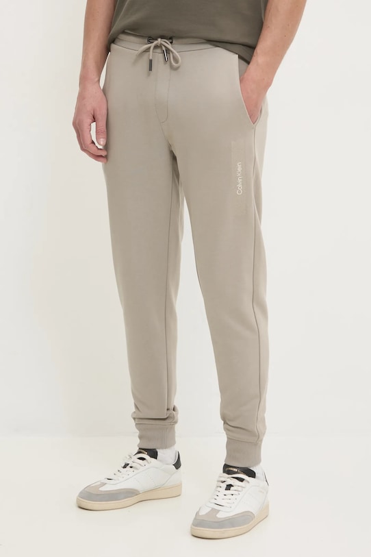 Calvin Klein spodnie dresowe bawełniane bawełna beżowy K10K113838